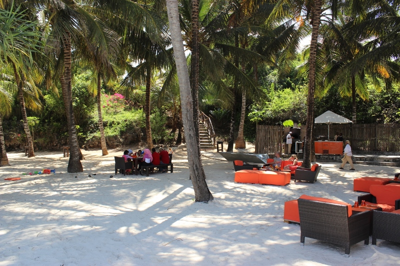 Gabi Beach Restaurant with loungers under the palm trees